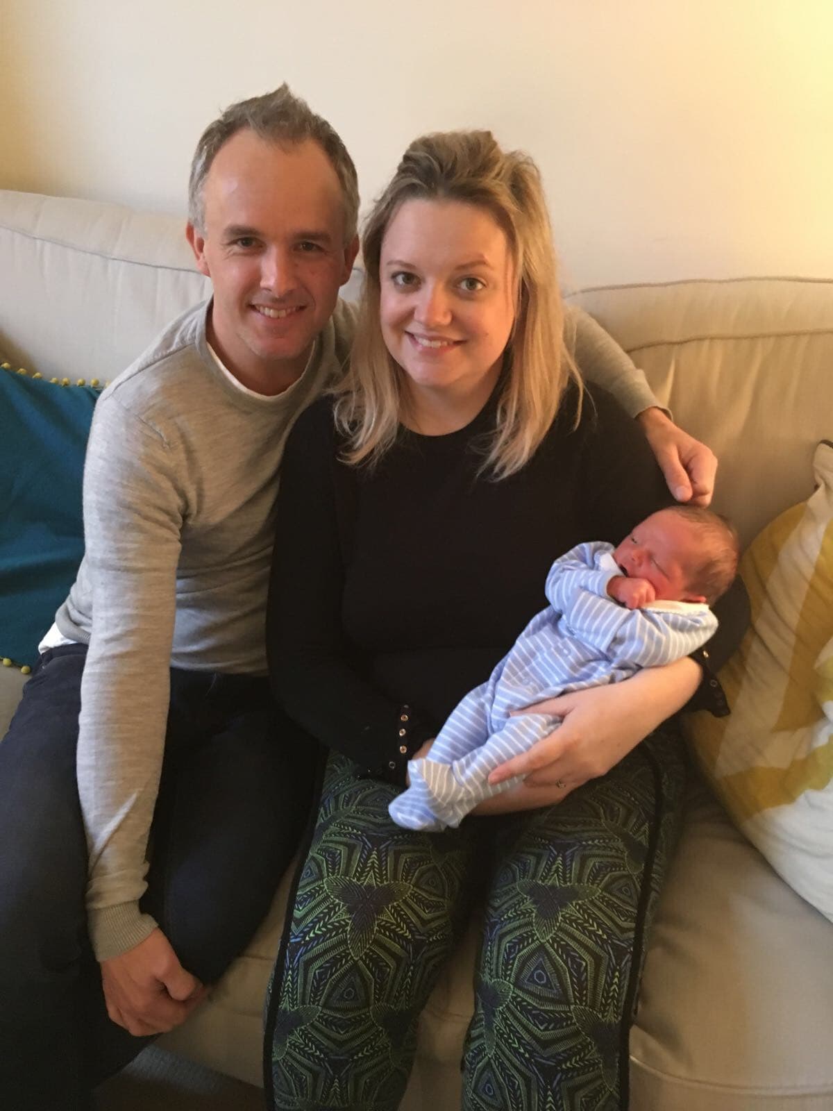 Image of Hughie, his wife and new born son.