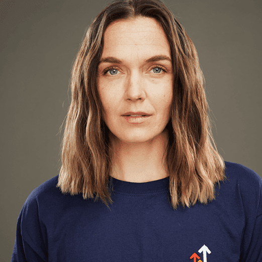 Headshot of Victoria Pendleton in a stand up to cancer t shirt.