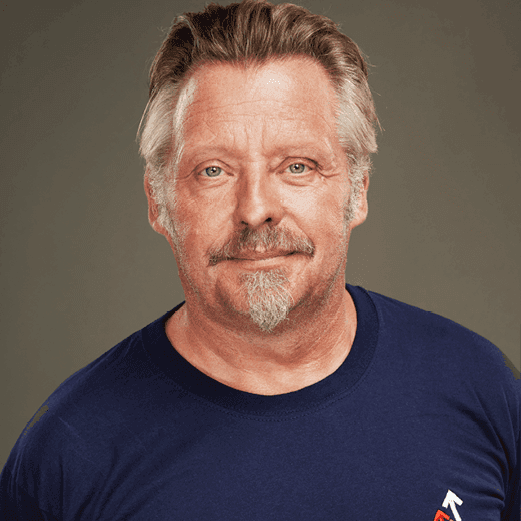 Headshot of Charley Boorman in a stand up to cancer t shirt.